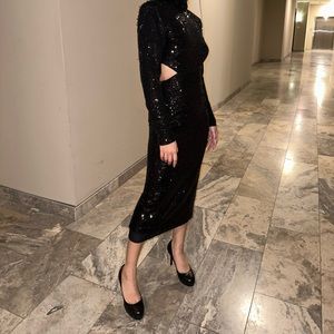 Black sequins gown size 0, snag areas